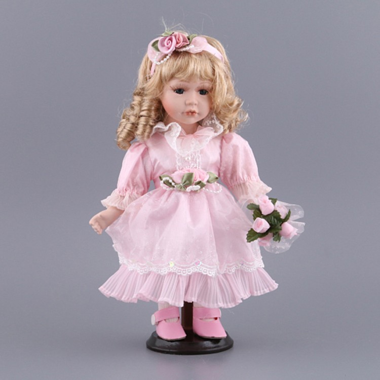 Фарфоровая кукла с мягконабивным туловищем высота=30 см Nanjing International (485-086) 