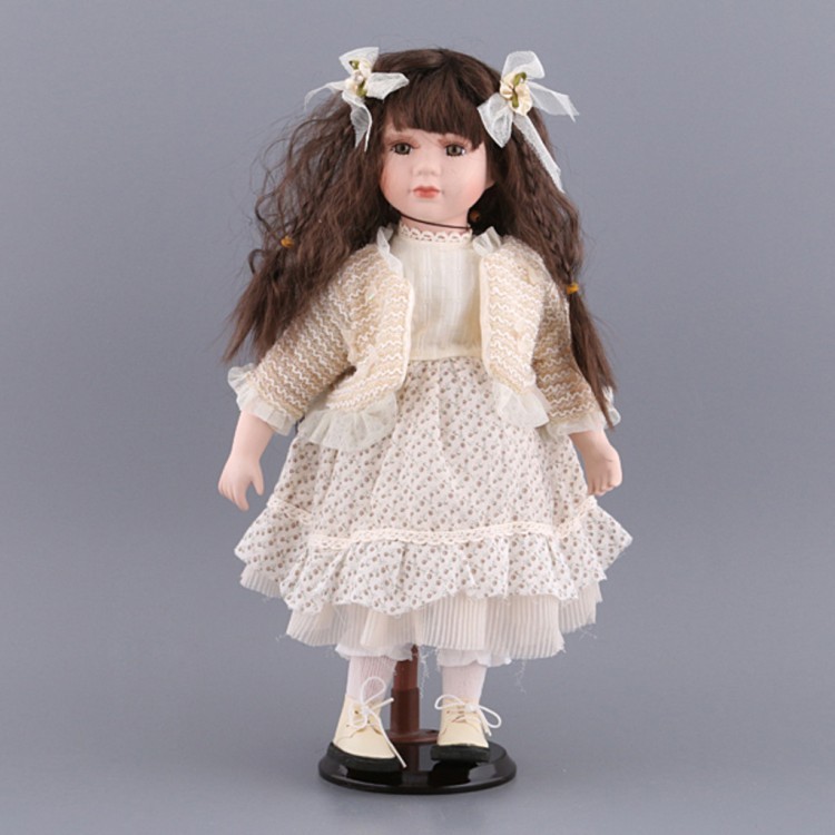 Фарфоровая кукла с мягконабивным туловищем высота=40 см Nanjing International (485-088) 