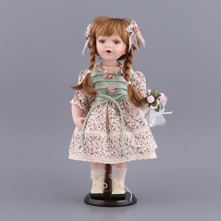 Фарфоровая кукла с мягконабивным туловищем высота=38 см Nanjing International (485-085) 